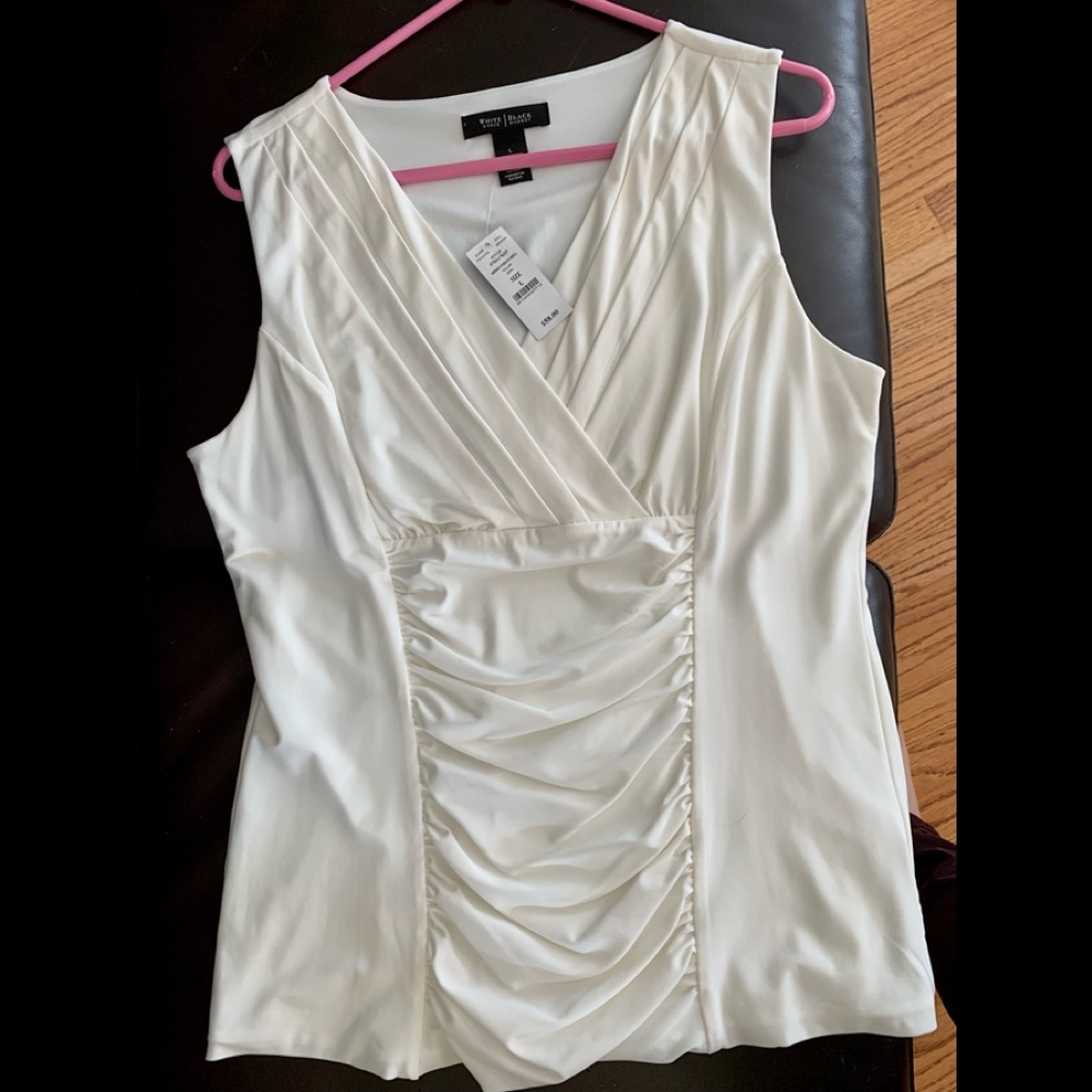 NWT ivory sleeveless top.